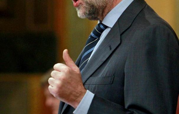 Rajoy aparca las diferencias con Zapatero y destaca su compromiso con el euro