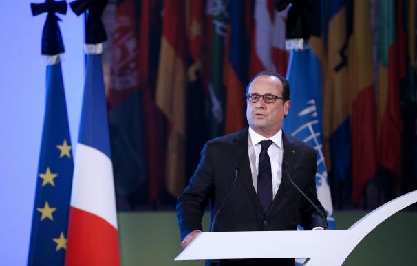 French President Francois Hollande delivers a spee