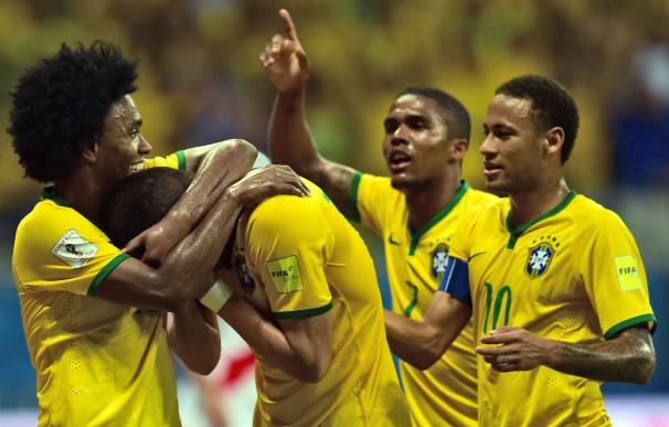 (L to R) Brazil's Willian, Renato Augusto, Douglas