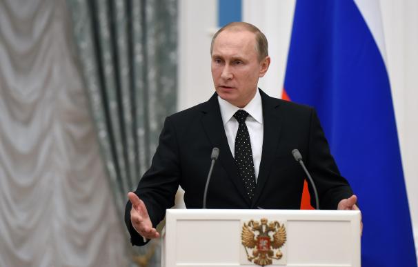 Russian President Vladimir Putin speaks during a p