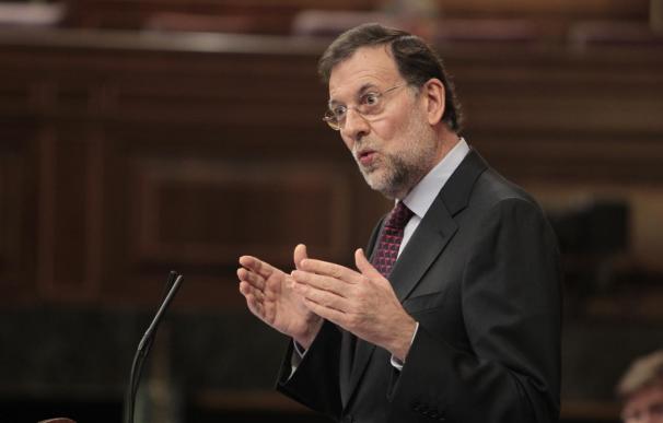 Rajoy dice que "le gustaría" bajar el IRPF en 2014 y prevé que este año el empleo caiga menos de lo previsto