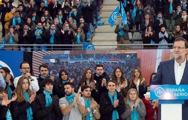 Rajoy abre su mitin en Madrid con un recuerdo a los policías muertos en Kabul y pidiendo unidad a los partidos