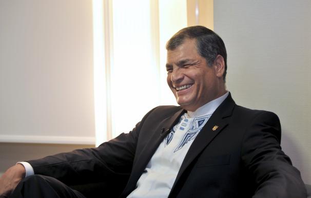 Ecuadoran President Rafael Correa smiles prior to