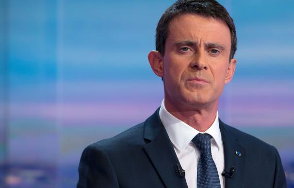 French Prime Minister Manuel Valls poses on Decemb