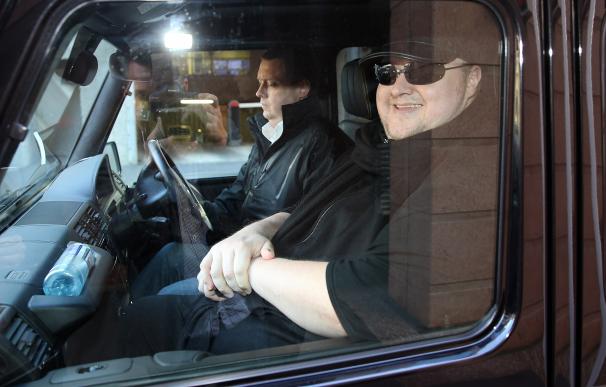 Kim Dotcom leaves court for the day after attendi