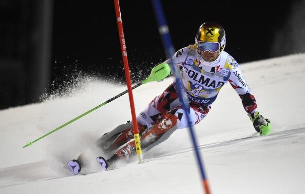 Austria's Marcel Hirscher clears a gate during the