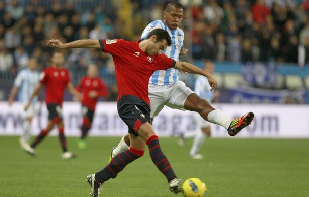 Málaga y Osasuna empatan en un duelo de estilos