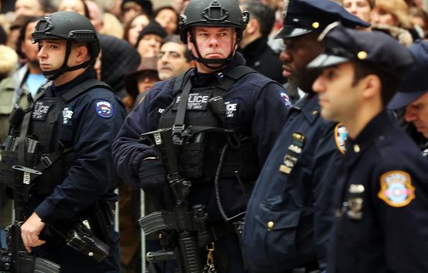 NEW YORK, NY - DECEMBER 30: Thousands of police, m