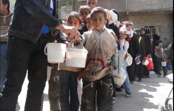 UNRWA retoma el reparto de alimentos en Yarmuk (Siria) tras tres meses sin poder ayudar a los refugiados