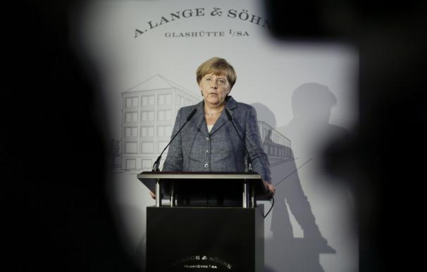 German Chancellor Angela Merkel delivers a speech