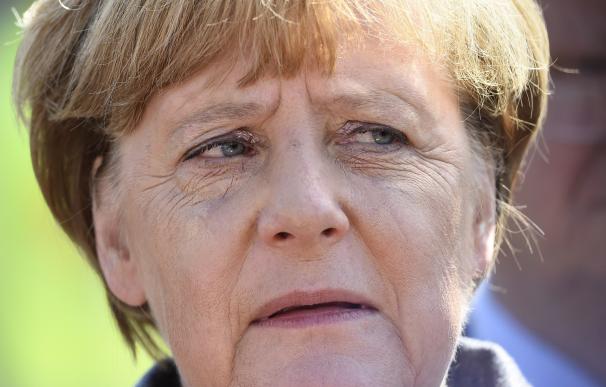 German Chancellor Angela Merkel makes a statement