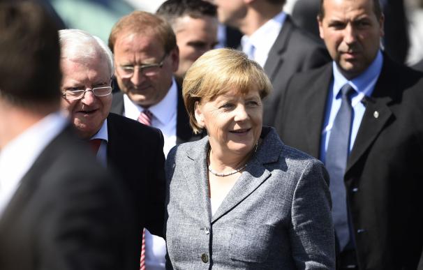 German Chancellor Angela Merkel arrives to visit a