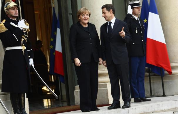 Angela Merkel And Nicolas Sarkozy Launch Eurozone Crisis Talks