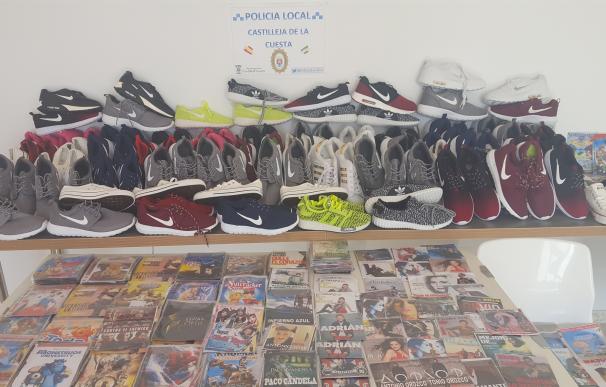 Decomisadas zapatillas deportivas y CD y DVD pirateados con destino al mercadillo de Castilleja