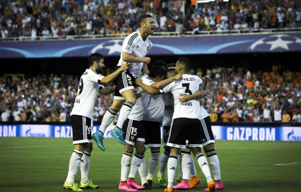 Valencia players celebrate after scoring during th
