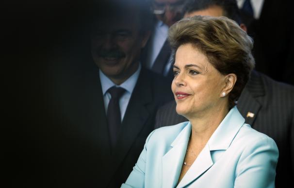 Brazilian President Dilma Rousseff poses for a pic