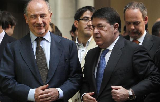 Olivas coincide con Rato al asegurar que el Banco de España apremió la fusión