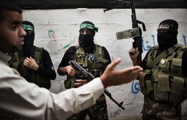 Miembros de las brigadas Ezzedine al-Qassam en Gaza el 22 de noviembre de 2012. (Photo: AFP - Marco Longari)