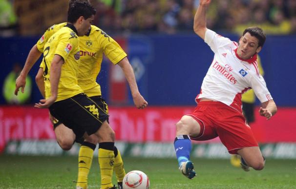 El líder Dortmund salva un punto en el último minuto ante el Hamburgo