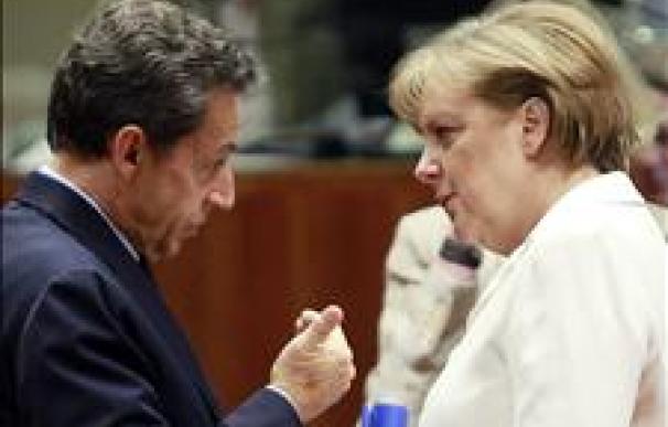 Sarkozy y Merkel buscan hoy un frente común para gestionar la crisis