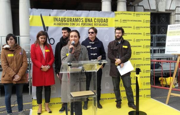 Amnistía Internacional y elAyuntamiento de València salen a la calle para reclamar una "ciudad acogedora" de refugiados