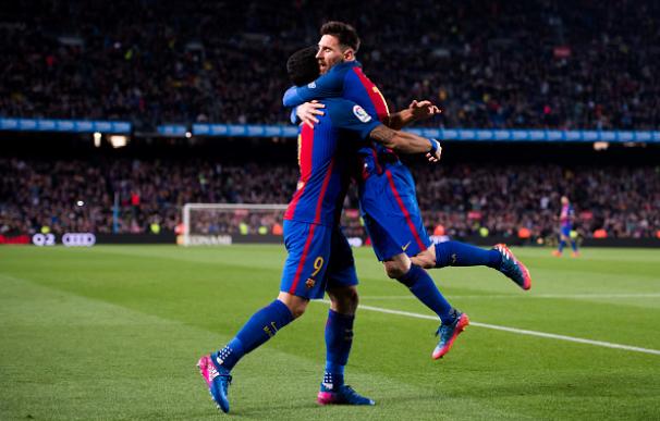 Messi celebra uno de sus goles ante el Valencia