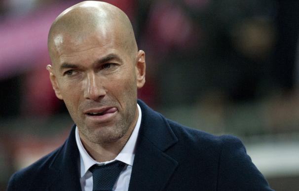 Real Madrid's French coach Zinedine Zidane looks o