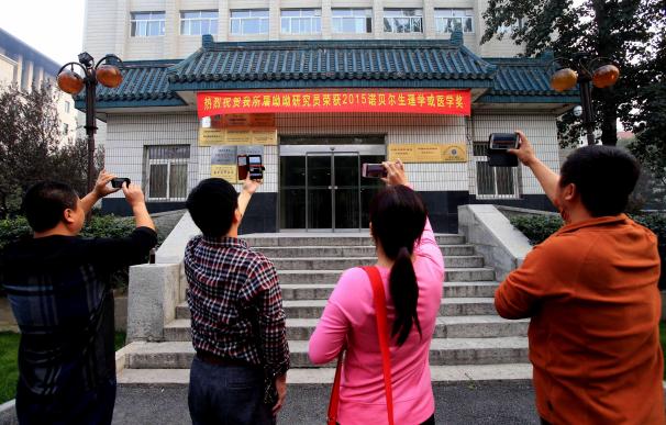 Chinese well-wishers gather outside the China Acad