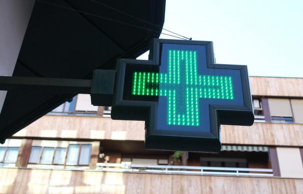 Una cruz de una farmacia en Cataluña