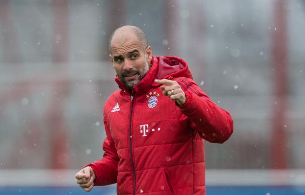 FC Bayern Munich's Pep Guardiola attend a training