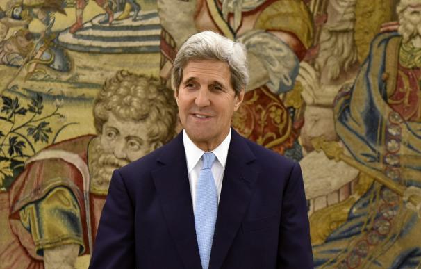 US Secretary of State John Kerry poses before the