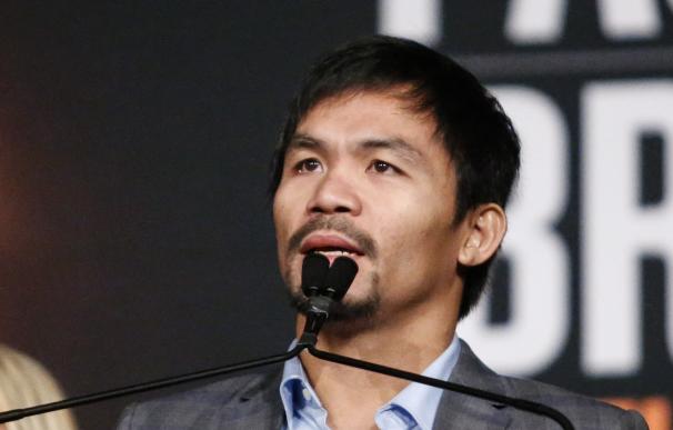 Boxer Manny Pacquiao speaks during a press confere