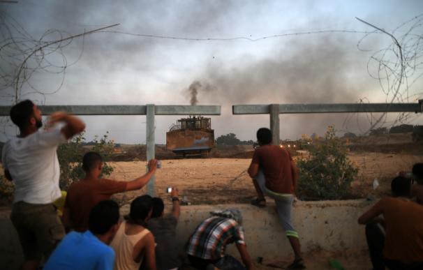 Ciudadanos palestinos durante los recientes enfrentamientos contra las fuerzas de Israel/AFP