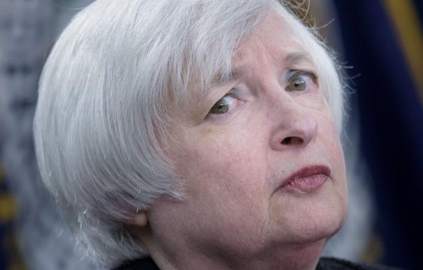 Federal Reserve Chair Janet Yellen listens to a qu