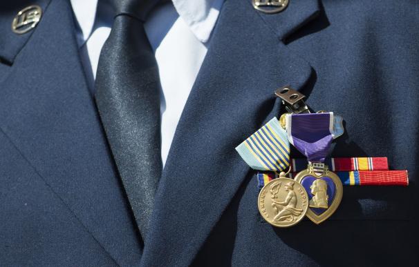 A Purple Heart and Airman's Medal are affixed to t