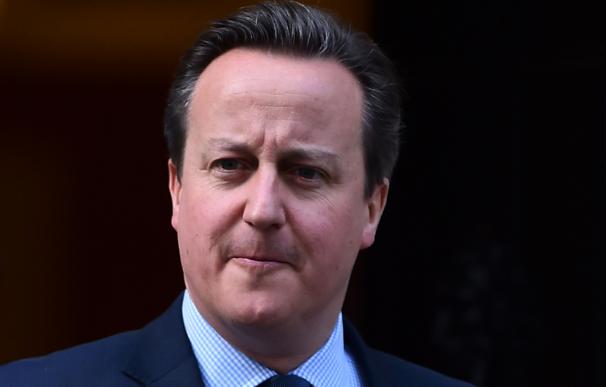British Prime Minister David Cameron leaves 10 Dow
