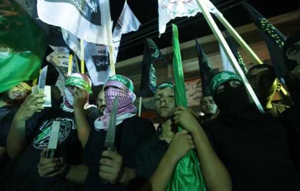 Supporters of the Islamist movement Hamas gather d