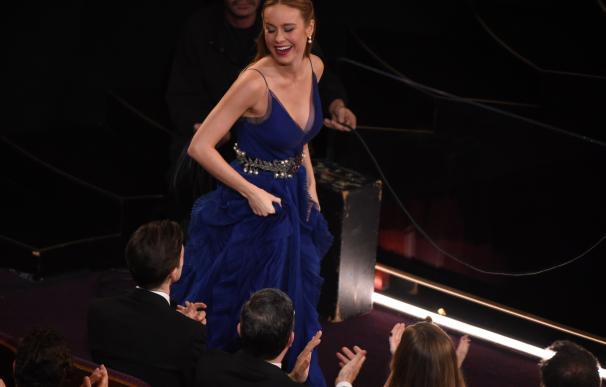 Actress Brie Larson walks to the stage to accept h