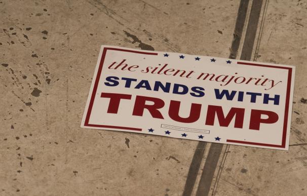 A Donald Trump campaign sign is seen at a Trump ra