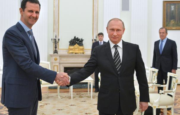 El presidente de Rusia, Vladimir Putin y su homólogo sirio, Basher al Assad / AFP