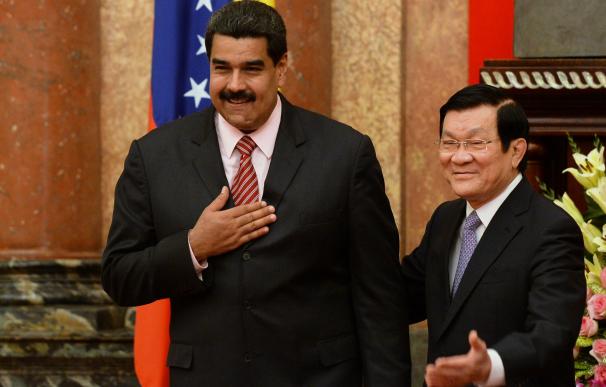 Venezuela's President Nicolas Maduro (L) is greete