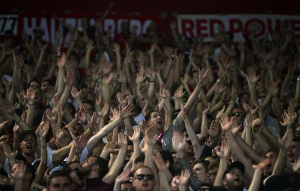 Bayern Munich's supporters cheer before a Group F