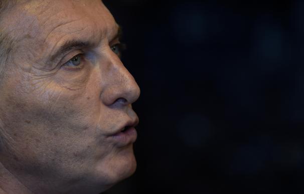 Argentina's President Mauricio Macri offers an int