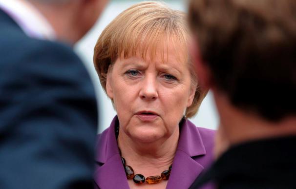Los países industrializados aceptan recortar su déficit a la mitad para 2013, dice Merkel