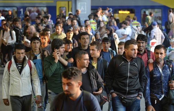 Refugiados llegando a la estación de tren de Múnich