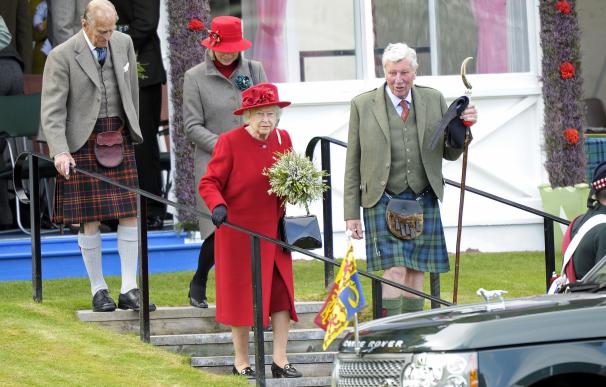Britain's Queen Elizabeth II (C) attends the annua