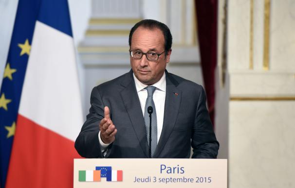 French President Francois Hollande speaks during a