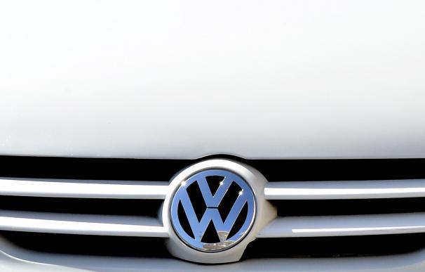 A logo of Volkswagen is seen on a taxi car in cent