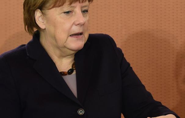 German Chancellor Angela Merkel arrives for a week