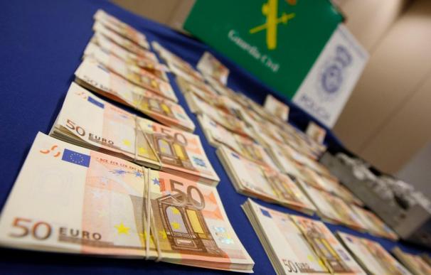 Cae una banda que falsificaba dinero con más de 400.000 euros en su poder